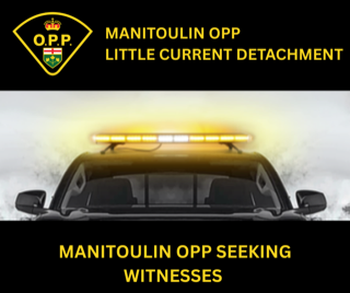 OPP cruiser with emergency lights on. Manitoulin OPP seeking witnesses