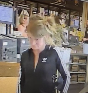 Person in black Adidas tracksuit, blurred motion