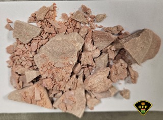 Brown crystalline substance