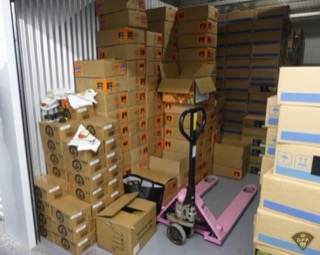 Stacked boxes in a warehouse.
