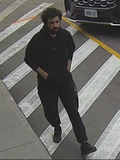 Person walking across a crosswalk