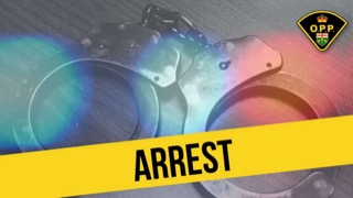 Handcuffs over a blurred background. Arrest