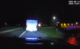 White van with flashing blue and red lights.