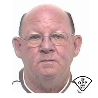 Man with glasses, facing forward