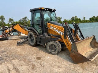 Case 580 Super N backhoe with bucket extended