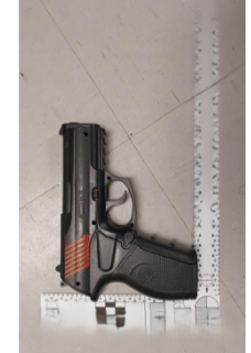 Black pistol with red accents