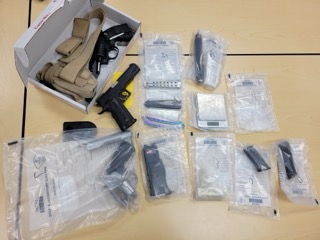 Firearm in box with paperwork