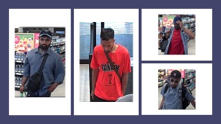 Four framed photos of people.