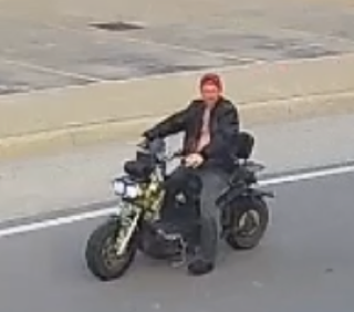 Person on a green motorcycle