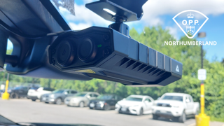 Dashboard camera mounted inside a vehicle