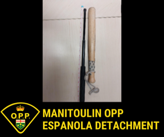 Two batons, one wooden, one expandable, crossed at the handles.