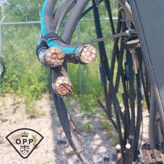 Damaged electrical wires wrapped in blue tape