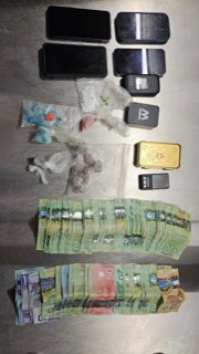 Canadian currency and small packages.