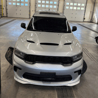 Silver Jeep Grand Cherokee, front view
