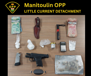 Firearm, magazines, knives, cash, and drugs on a wooden surface.