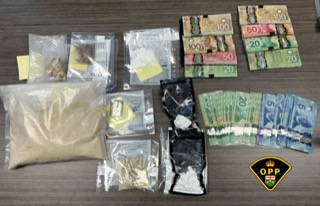 Packages of suspected drugs and Canadian currency.