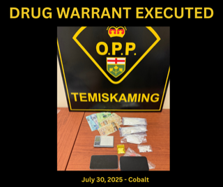 Canadian currency and small packages on a table