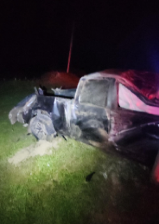 Damaged pickup truck on grass