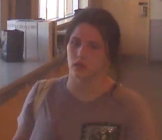 Person looking up, gray t-shirt