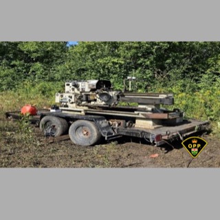 Drill rig on a trailer.