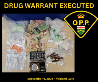 Pile of cash, drugs, and ammunition.