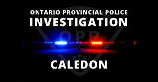 OPP crest with flashing blue and red lights