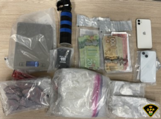 Scales, baggies, Canadian currency, smartphone