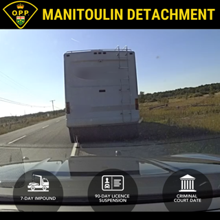 Tow truck with impounded vehicle.