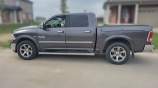 Gray Ram 1500 pickup truck side view
