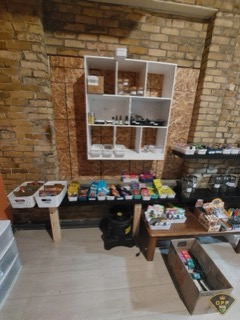 Shelves stocked with products.