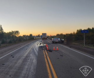 Debris and traffic cones on a highway.