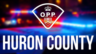 Ontario Provincial Police logo with a blurred background