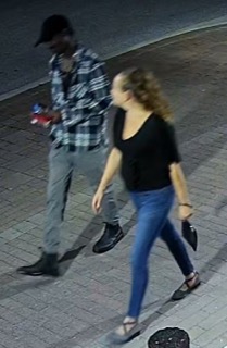 Two people walking, blurry