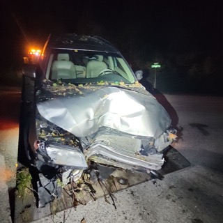 Damaged gray SUV front end