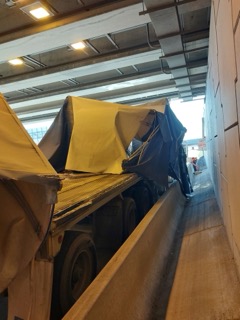 Loading ramp leading into a truck trailer.