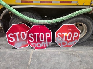 Two stop signs, STOP