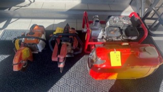 Several red and yellow power tools.