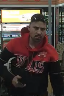 Man in a red Chicago Bulls hoodie