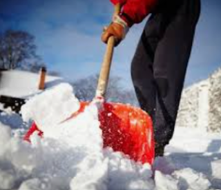 Person shoveling snow.