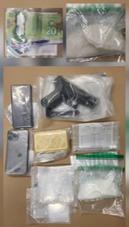 Canadian twenty dollar bill, smartphone, handgun, gold bar, plastic bags, document