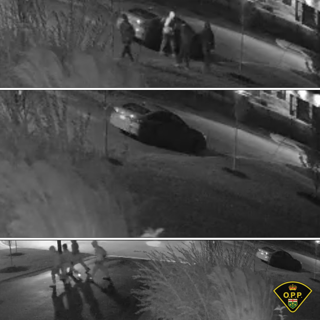 Vehicle on its side, emergency personnel present