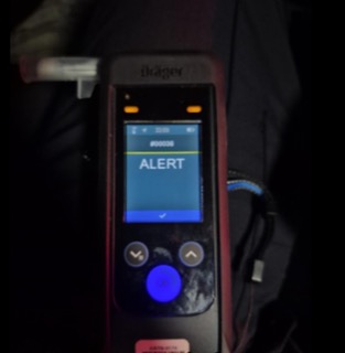 Dräger device displaying ALERT in large red text