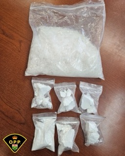 White powder in plastic bags.
