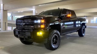Black lifted pickup truck