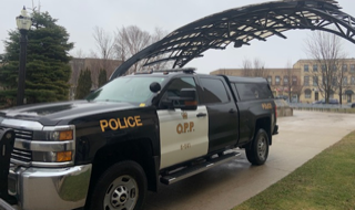 Black and white police truck. OPP.