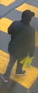 Person walking across a crosswalk