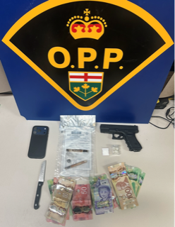 Canadian flag and OPP logo on a blue background. Knives, cash, and two handguns.