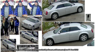 Multiple people in blue jackets, silver sedan, blurry background