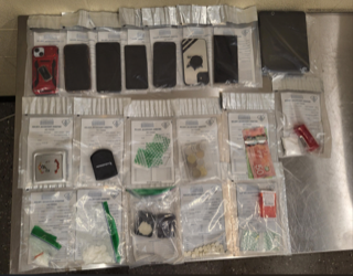 Several small, clear plastic bags with various items.