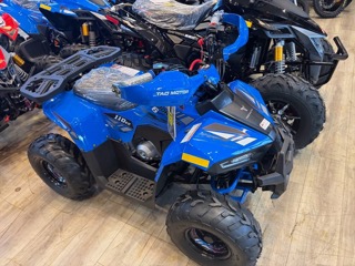 Blue four-wheeler with red accents